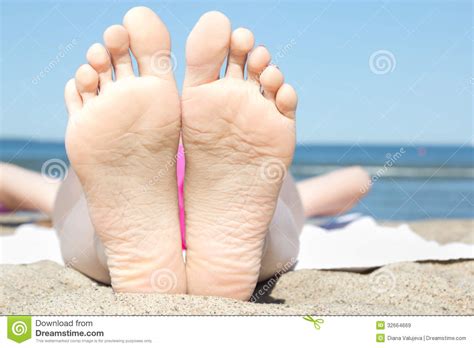 female feet on the beach near the sea stock image image of beach