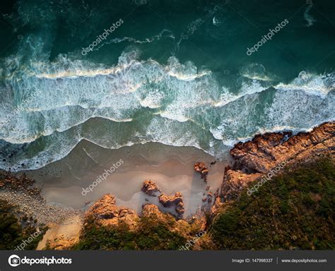 ocean waves breaking  coastline stock photo  daxiaoproductions