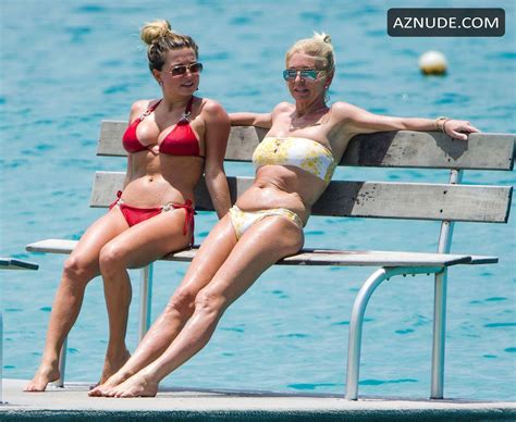 zara holland spotted on the beach in barbados donning a sexy red piece