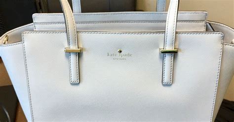 is this kate spade bag white or blue it s the dress debate again and people are getting angry