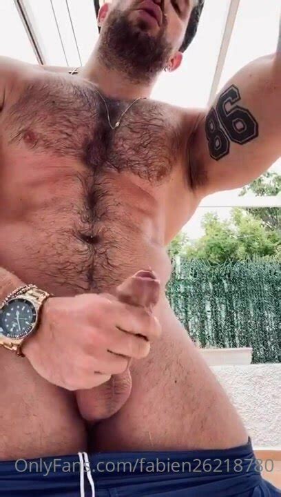 handsome hairy guy blows a load and licks his cum