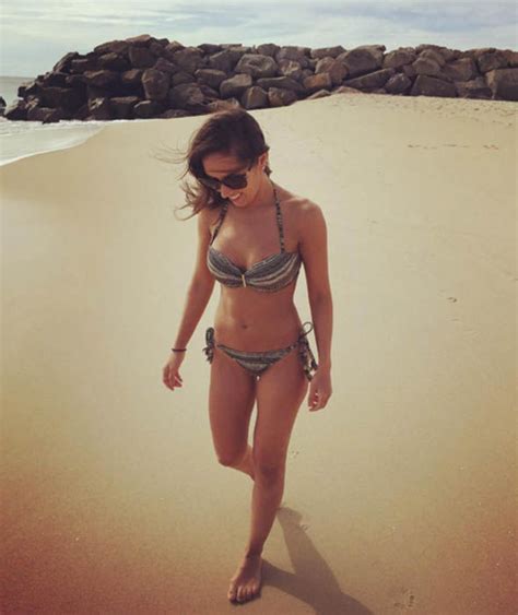 Janette Manrara Goes For A Walk Along The Beach In Her Bikini