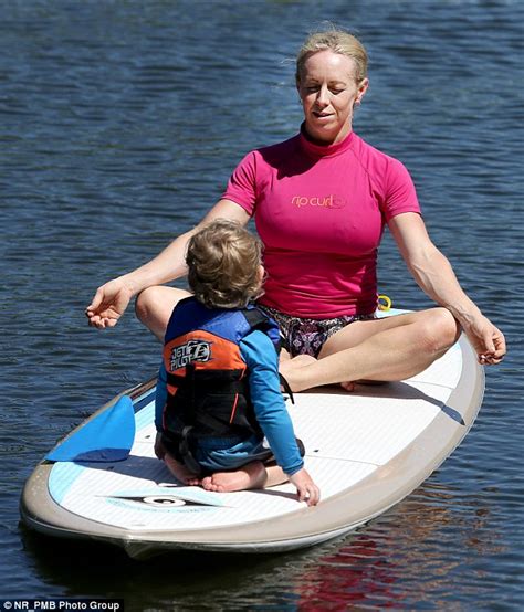 meet the mother who does yoga on her stand up paddle board while her son looks on daily mail