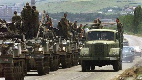 vj vojska jugoslavije fap  truck passing  british armored vehicleskosovo war