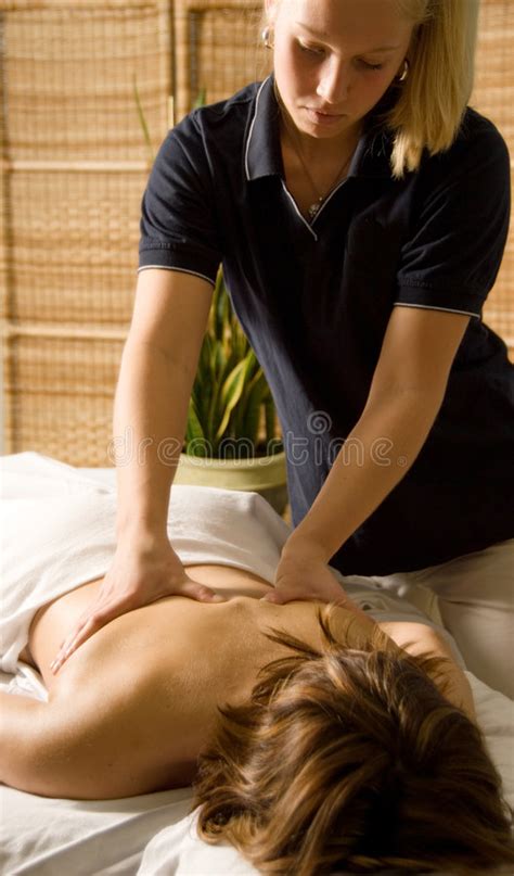 massage therapist giving woman massage stock image image