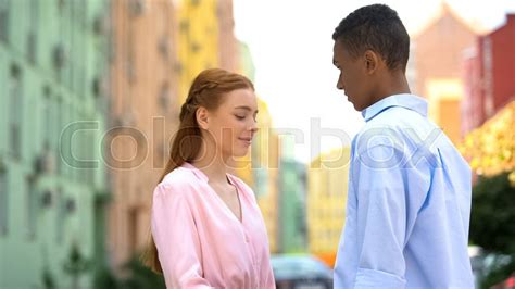 shy couple having romantic date first stock image