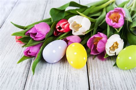 premium photo easter eggs  tulips