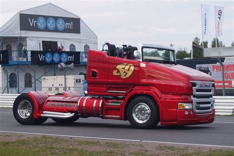 the scania r999 v8 red pearl is a roadster truck that does burnouts and