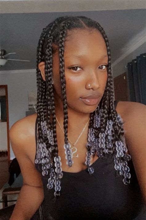 knotless braids with beads in 2021 big box braids hairstyles natural