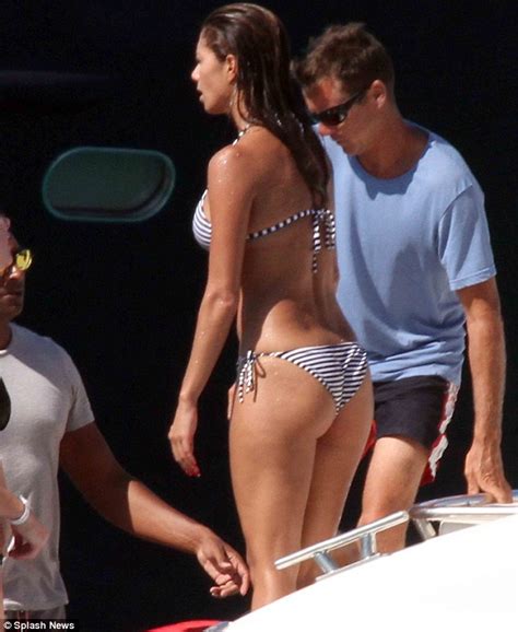 nicole scherzinger shows off her pert derriere in tiny string bikini as she enjoys a holiday in