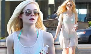 elle fanning looks ethereal in floaty white summer dress and tumbling blonde hair daily mail