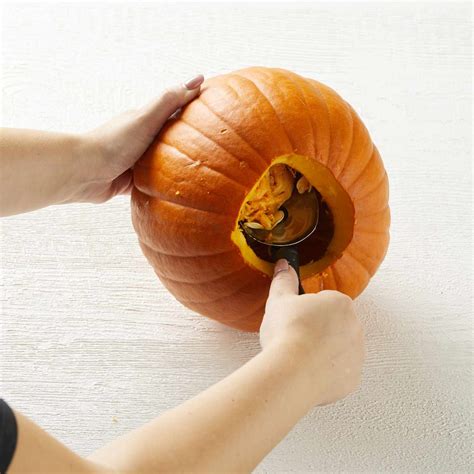 how to carve a pumpkin in 4 easy steps better homes and gardens