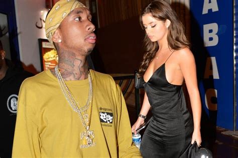 tyga ignores sex tape drama as he parties with his new