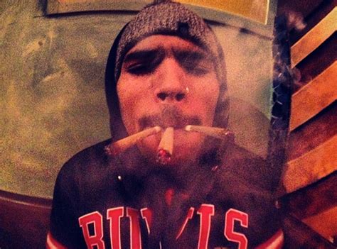 chris brown smokes three joints—see the pic e online