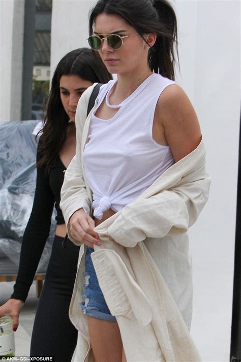 Kendall Jenner Shows Off Her Nipple Piercing As She Goes