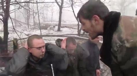 Ukrainian Soldiers Forced To Eat Their Uniform By Russian Separatist