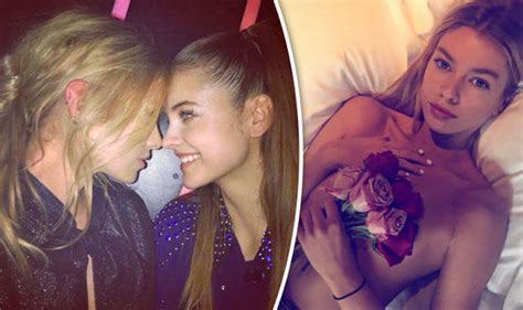 stella maxwell gets very cosy with victoria s secret s barbara palvin after topless snap