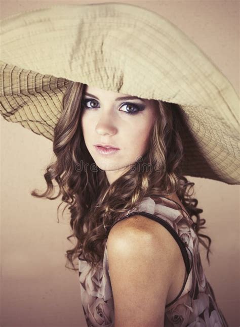 woman wearing big hat stock photo image  beautiful