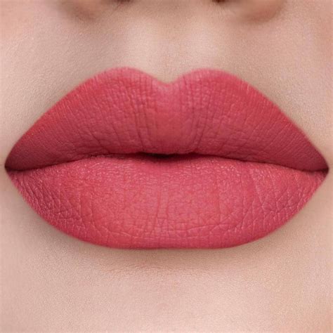 pretty coral lipstick focus beauty style