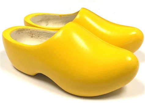 yellow wooden shoes dutch clogs  yellow