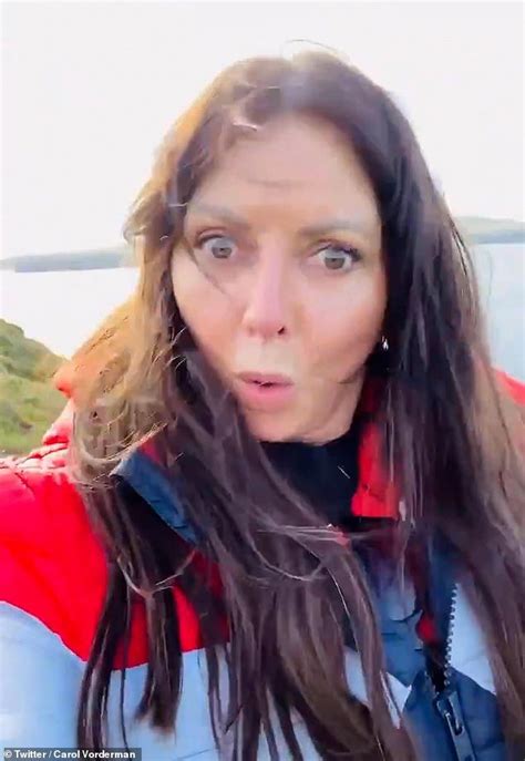 carol vorderman enjoys a windy hike in the welsh countryside