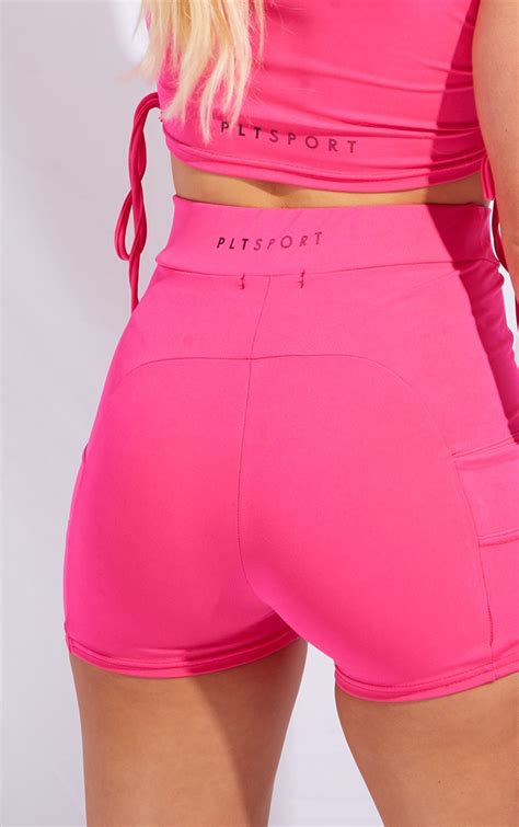 prettylittlething hot pink sport panelled booty shorts
