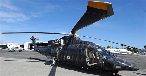 kobe bryants helicopter previously owned   state  illinois  sold    auction