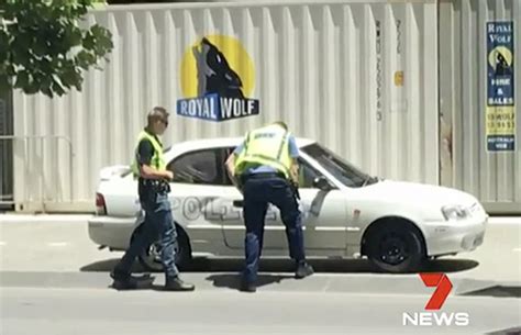 australian woman stopped after driving fake cop car in