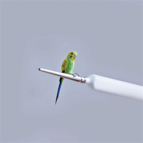 copenhagen based miniature artist katie doka fabricates exquisitely detailed miniature birds