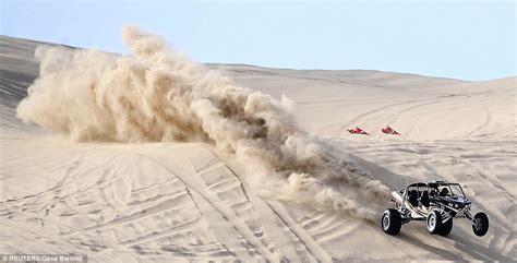 incredible pictures  thousands riding buggies  sand dune festival daily mail