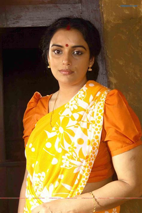 Swetha Menon Actress Hd Photos Images Pics And Stills