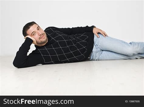 cool man lying   floor  stock images