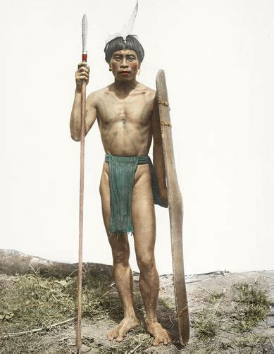 602950 An Ifugao Warrior Poses With A Shield And Spear