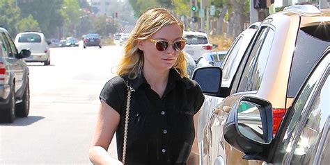 Kirsten Dunst Steps Out With A Boot On Her Leg Following Injury
