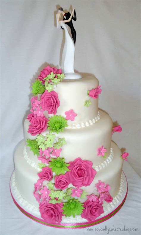 hot pink  lime green cascading flowers wedding cake