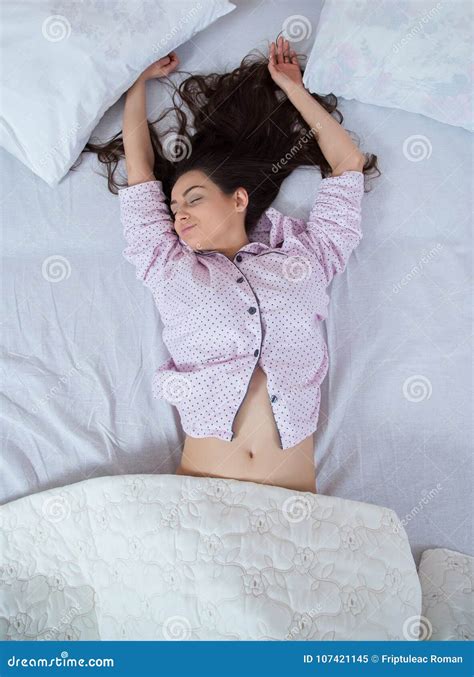 Girl Sleeps In A White Bed At Home Young Woman Sleeping In Sleepwear