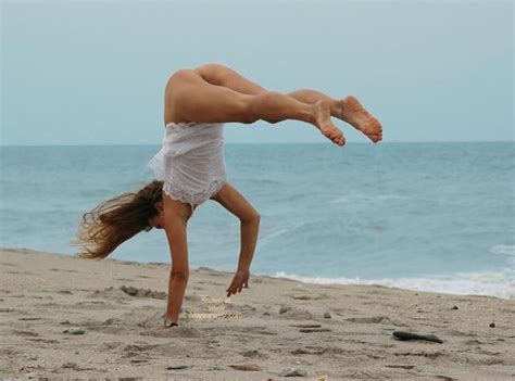 Half Nude Gymnast On Beach At Voyeur Web