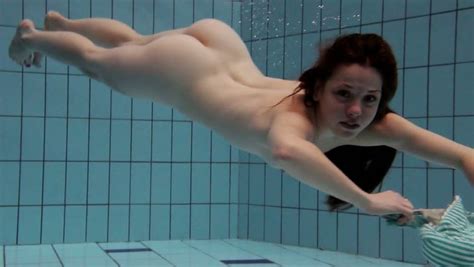 sweet and delightful redhead beauty getting naked underwater mylust