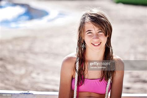 Smiling Girl On The Beach Photo Getty Images
