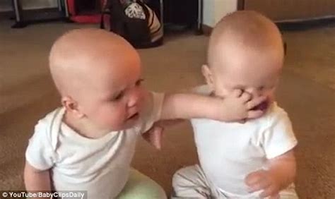 cute twin babies    hit   fight   dummy daily mail