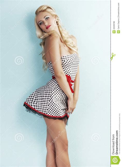 Sensual Pin Up Lady With A Red Belt Royalty Free Stock
