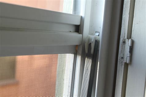 how to re insert a single hung window into the frame over the guide rods home improvement