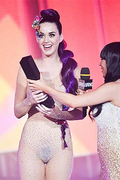 singer katy perry displays her curves in a see through