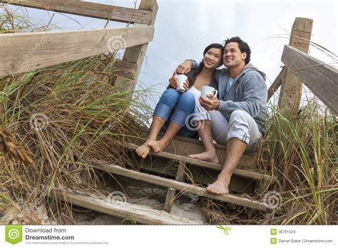 Asian Man Woman Romantic Couple On Beach Steps Stock