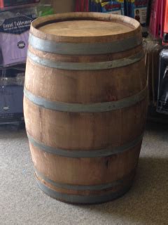 destination  large weathered wine barrel