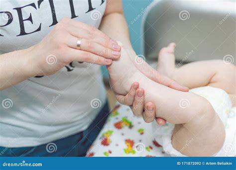 baby massage mother  massaging  baby health massage stock photo image  infant baby