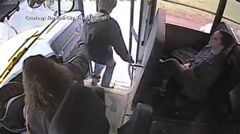 video bus driver saves teen exiting school bus moments before speeding car drives by
