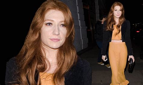 nicola roberts flashes her taut stomach in a orange co ord