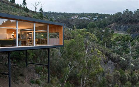 modern single story house   sloped lot  tasmania
