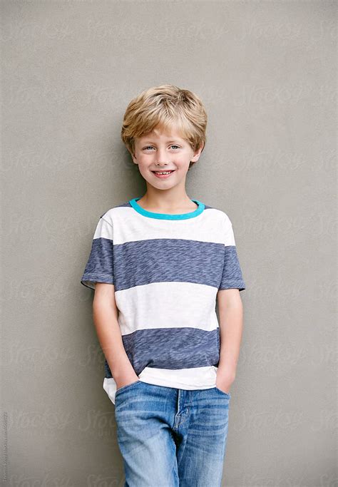 portrait  young boy smiling  stocksy contributor trinette reed
